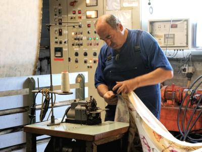 Mitloedi Textildruck AG - Second-Hand-Kleidung in Glarus
